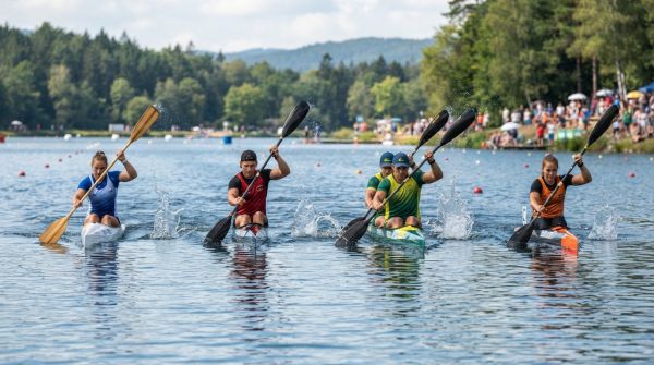 What are the biomechanical benefits of using different paddles in competitive canoeing?